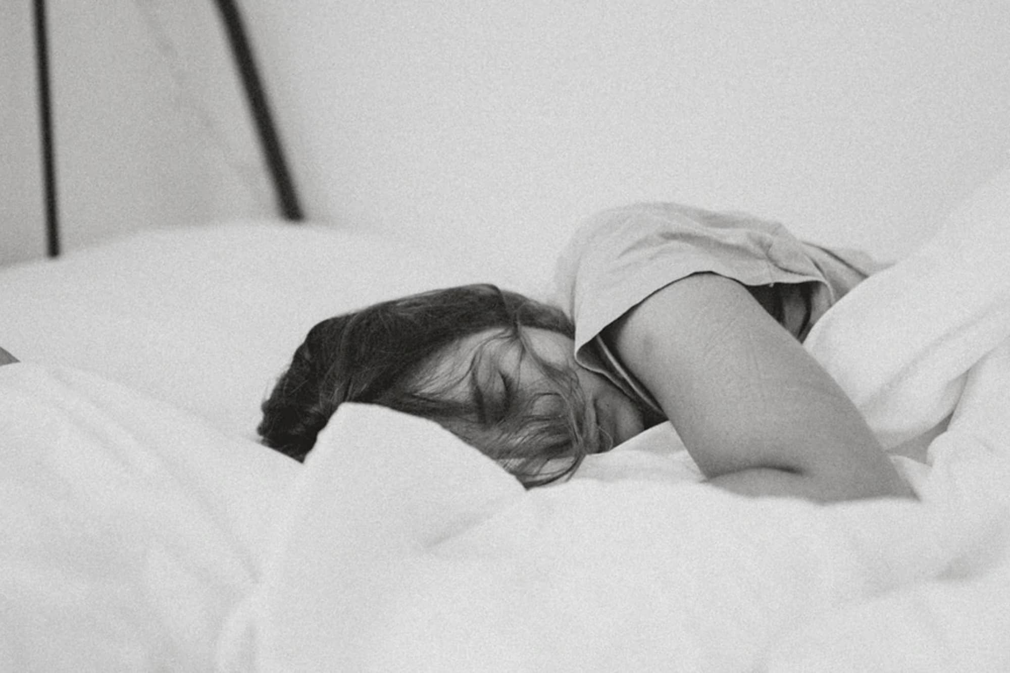 black and white girl in bed